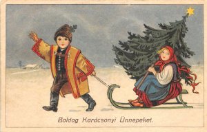 Lot267 christmas karacsonyi boy and a girl on a sledge fir hungary greetings