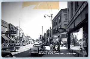 Manistee Michigan MI Postcard RPPC Photo River Street Rexal Drugs Store Philco