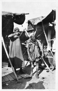 US17 Africa Algerie water carrier market typical scene ethnic costume Morocco