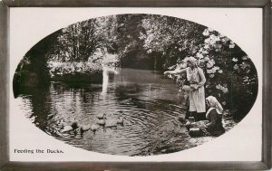 England rural life - Feeding the Ducks 1910