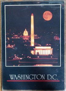 Capitol,Monument + Memorial black sky, orange moon,Washington DC Postcard 1983