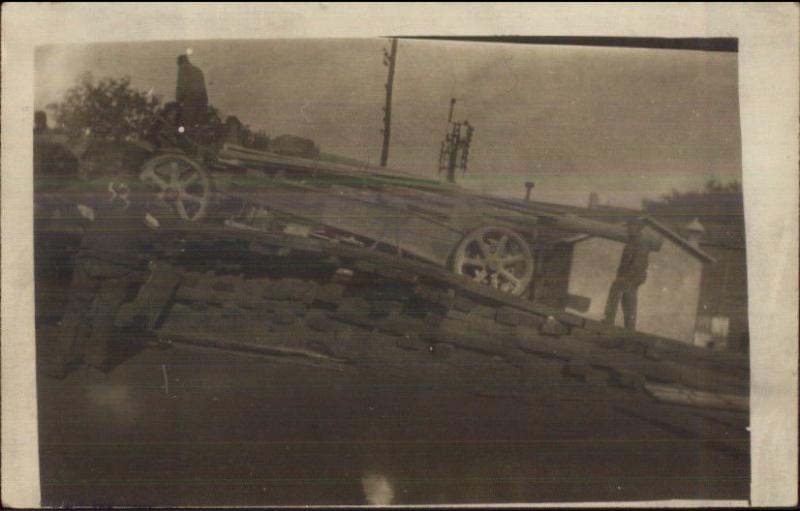 WWI Era Soldiers Loading or Unloading Cannon c1915 Real Photo Postcard