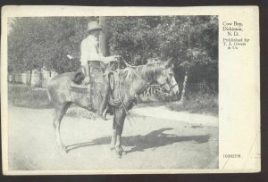 DICKINSON NORTH DAKOTA ND COWBOY ON HORSE VINTAGE POSTCARD TJ GREEN CO.