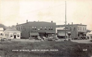 RPPC STORES & CARS MAIN STREET NORTH ANSON MAINE REAL PHOTO POSTCARD 1944