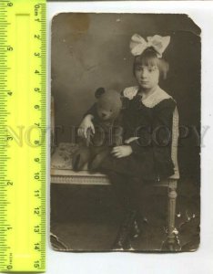 433538 Russia 1928 year girl with teddy bear and bow photo