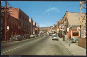 NY Main Street North LIBERTY 1950s cars Store Fronts Express Inter-City Buses C