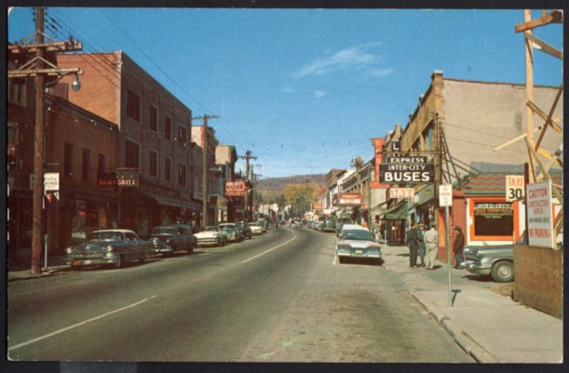 NY Main Street North LIBERTY 1950s cars Store Fronts Express Inter-City Buses C