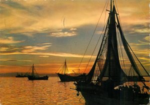 B522 Boats & sailing vessels nautical themed postcard sunset Ostend Belgium 1965