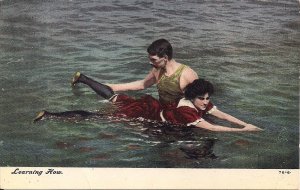 Handsome Man Teaching Beautiful Woman to Swim, 1910, Old Swimsuits