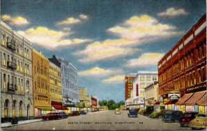 VINTAGE POSTCARD FIFTH STREET MERIDIAN MISSISSIPPI WITH ROWS OF OLD CARS