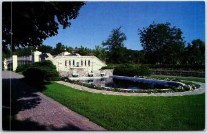 VINTAGE POSTCARD GARDEN AND POND AT FOOTBRIDGE UNIVERSITY OF IOWA AT IOWA CITY