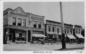 J71/ Lodi Ohio RPPC Postcard c1910 Business Block Stores Wagons  426