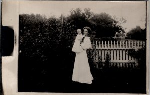 RPPC Woman with Baby in Garden Real Photo Postcard Z30