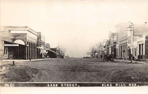 H15/ Blue Hill Nebraska RPPC Postcard c1910 gage Street Stores Bank