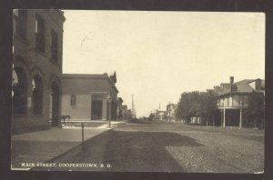 RPPC COOPERSTOWN NORTH DAKOTA DOWNTOWN MAIN STREET SCENE REAL PHOTO POSTCARD