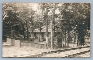 HOMES NEXT TO RAILROAD TRACKS ANTIQUE REAL PHOTO POSTCARD RPPC