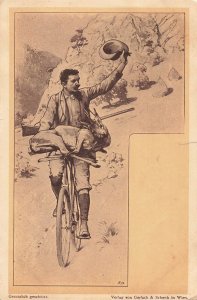 MAN RIDING BICYCLE CARRYING LONG GUN & DEAD DEER-1900s AUSTRIA POSTCARD