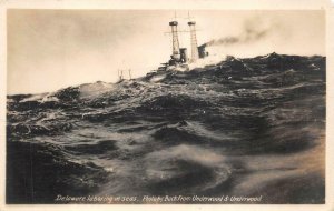 RPPC USS DELAWARE LABORING AT SEA UNDERWOOD BUCK REAL PHOTO POSTCARD (c. 1920)