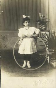 Young Spanish Girl in Dress with Hula Hoop Toy (1910s) RPPC Postcard