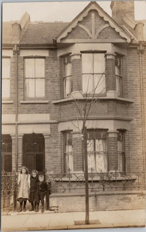 Portrait of Three Children Girls Boy House Home Unused Real Photo Postcard E88