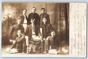 1906 Marching Band Clarinet Trumpet Merton Wisconsin WI RPPC Photo Postcard