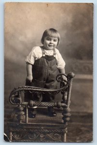 Cute Baby Postcard RPPC Photo Wicker Chair Overalls Studio c1910's Unposted