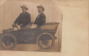 Texas Men riding in Car Tourist Studio Real Photo Vintage Postcard AA65923