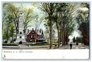 1907 Soldiers Monument Park Trolley Buildings Dirt Road Trees Nashua NH Postcard 