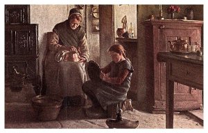 Mother and Daughter polishing copper pans