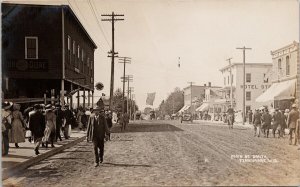 Fennimore Wisconsin Main Street USA Flag Hotel John Deere Sign RPPC Postcard H59