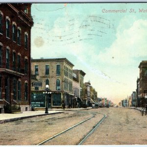 c1910s Waterloo, IA Commercial St. Downtown Stores Litho Photo Postcard Car A62