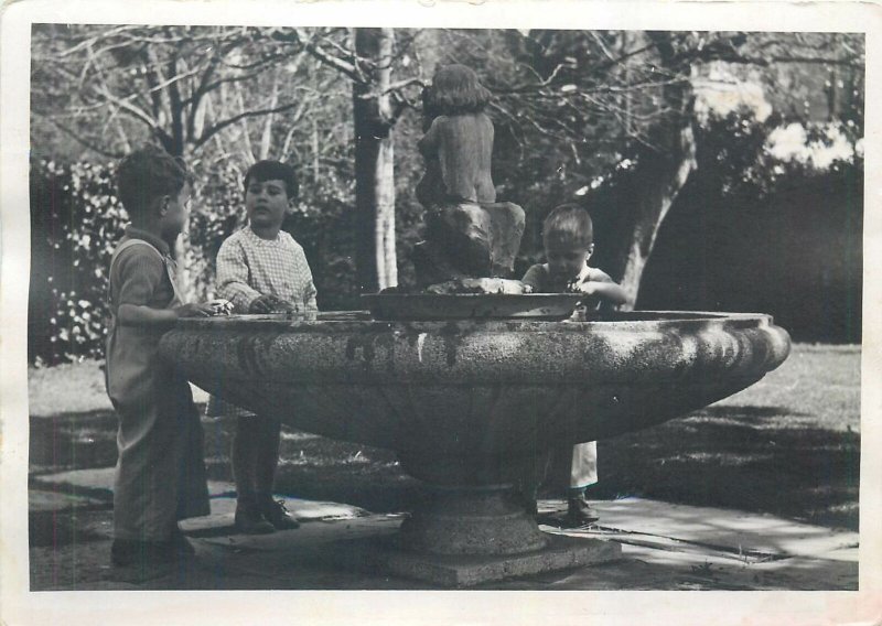 Postcard Social history kids children playing in fountain sculpture statue park