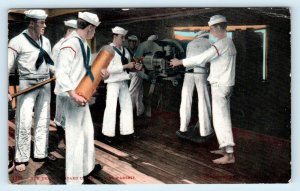 GUN DRILL Aboard US NAVAL WARSHIP  c1910s Mitchell #1329  Postcard