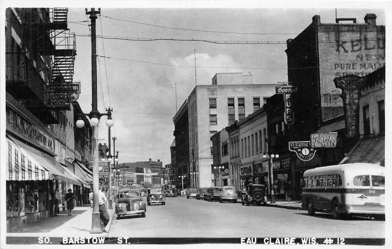 J69/ Eau Claire Wisconsin RPPC Postcard c40-50s Barstow St Stores 77