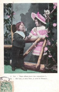 VINTAGE POSTCARD TWO CHILDREN PLAYING THE ROMANCING GAME WHITE BORDER c. 1922