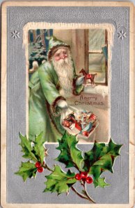 Christmas Postcard Green Suited Santa Claus at Windows Leaving Toys in Bag