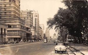 E16/ Juarez Mexico Real Photo RPPC Postcard 1949 Avenue Automobiles Buildings