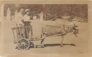 J19/ Estes Park Colorado RPPC Postcard c1940s Donkey Cart Gas Station  141