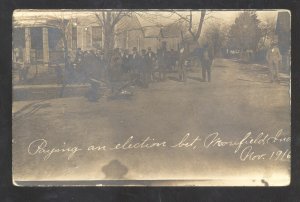 RPPC MOOREFIELD IOWA 1916 PAYING AN ELECTION BET DOWNTOWN REAL PHOTO POSTCARD