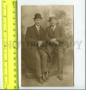 452666 RUSSIA two men in hats and coats Old photo