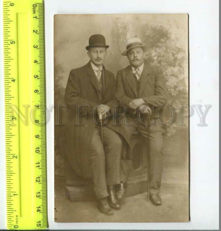 452666 RUSSIA two men in hats and coats Old photo