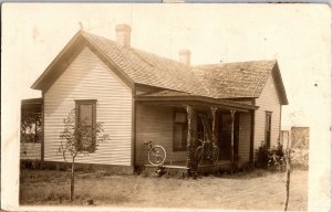 RPPC Postcard of Farm House Single Family Home & Unicycle Bicycle 1912
