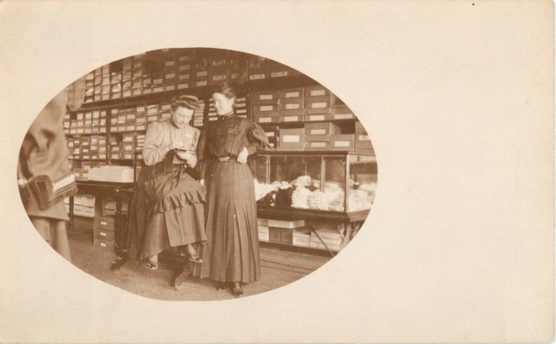 Woman running the show-Writing up Order-Shoe Store 1910 Real Photo Postcard RPPC