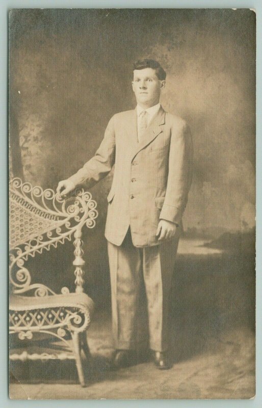 RPPC From J.P to Elsie~Gentlemen in Light Colored Suit~Fancy Wicker Settee 1910 