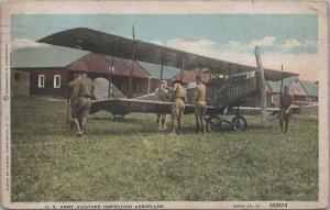 Postcard Military US Army Aviators Inspecting Airplane