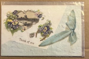 POSTCARD EMBOSSED - THINK OF ME - NOT POSTED BUT SOME WRITING ON BACK