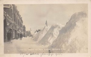 J81/ Kalkaska Michigan RPPC Postcard c1910 Beebe Main Street Stores Snow 270