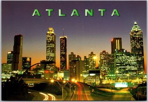 Atlanta Skyline As Night Falls Buildings Lights Atlanta Georgia GA  Postcard