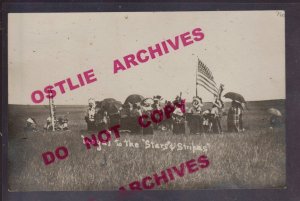 Selby SOUTH DAKOTA RPPC 1909 SIOUX INDIANS American Flag STARS & STRIPES Indian