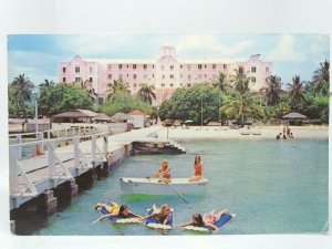 Young Ladies Relaxing in the Sea at Nassau Beach Hotel Bahamas Vtg Postcard 1974